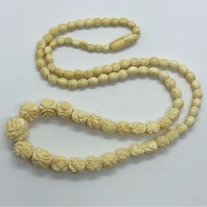 Art Deco carved bovine bone flower bead necklace22”